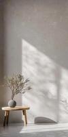 Clean and simple wall backdrop providing a minimalist setting for copy. photo