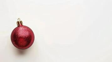 A red ornament with gold trim photo