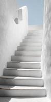 Minimalist White Staircase with Curved Walls Under Clear Blue Sky photo