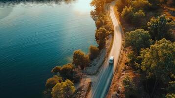 Overhead view of a road trip through a serene lakeside route photo