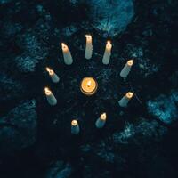 Mysterious Candlelit Circle in Dark Forest Setting with Eerie Atmosphere and Glowing Light photo