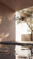 Tranquil Modern Patio with Sunlit Tree and Reflective Pool in Minimalist Architectural Design photo