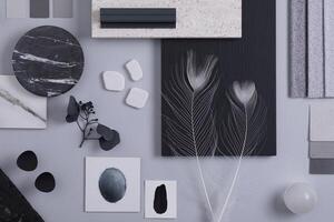 Creative flat lay composition in grey and black color palette with textile and paint samples, panels and tiles. Architect and interior designer moodboard. Top view. Copy space. Template. photo