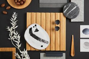 Creative flat lay composition with textile and paint samples, lamella panel and tiles. Stylish interior designer moodboard. White, black and grey color palette. Copy space. Template. photo