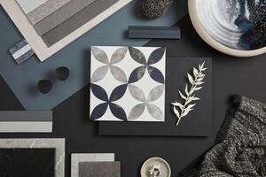 Flat lay of stylish architect moodboard composition with black, beige and grey samples of textile, paint, panels and tiles. Top view. Copy space. Template. photo