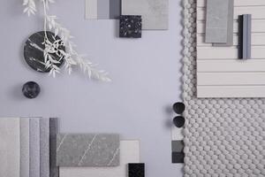 Elegant flat lay composition in grey color palette with textile and paint samples, lamella panels and tiles. Architect and interior designer moodboard. Top view. Copy space. photo