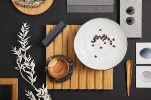 Creative flat lay composition with textile and paint samples, lamella panel and tiles. Stylish interior designer moodboard. White, black and grey color palette. Copy space. Template. photo