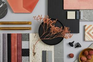 Creative flat lay composition with textile and paint samples, panels and tiles. Stylish interior designer moodboard. Pink, black and light grey color palette. Copy space. Template. photo