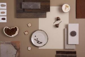 Flat lay of creative architect moodboard composition with samples of textile, paint, panels and tiles. Natural materials. Beige and brown color palette. Top view. Copy space. Template. photo
