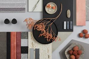 Creative flat lay composition with textile and paint samples, panels and tiles. Stylish interior designer moodboard. Pink, black and light grey color palette. Copy space. Template. photo