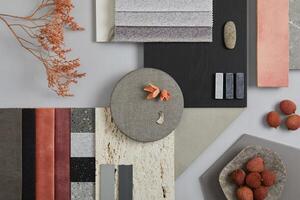 Creative flat lay composition with textile and paint samples, panels and tiles. Stylish interior designer moodboard. Pink, black and light grey color palette. Copy space. Template. photo