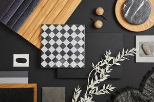 Stylish flat lay comosition of creative architect moodboard with black, white, beige and grey samples of textile, paint, wooden lamella panels and marble tiles. Top view. Copy space. Template. photo
