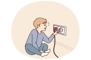 Small boy sticks fingers into socket, playing with electrical equipment and risking electric shock vector