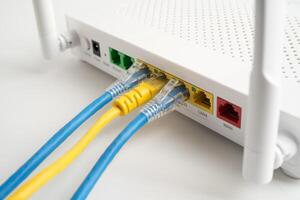 Ethernet cable with wireless router connect to internet service provider internet network. photo