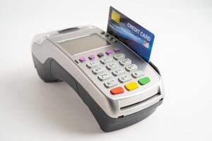 Payment POS terminal isolated on white background with colpy space, technology for finance and shopping business. photo