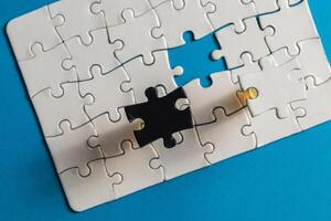 Conceptual photo of puzzle, choosing the correct option on blue background