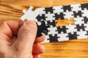 Choosing the right option. Conceptual image using a black and white puzzle photo