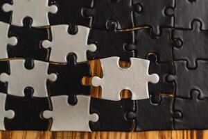 Choosing the right option. Conceptual image using a black and white puzzle photo
