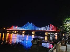 Nighttime light show on bridge city waterfront photography urban environment scenic viewpoint urban aesthetics photo