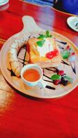 Delicious dessert creation cozy cafe food photography warm ambiance close-up view culinary delight photo