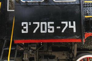 Text and numbers on a metal surface with the symbols of the USSR for design and commercial use photo