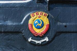 Text and numbers on a metal surface with the symbols of the USSR for design and commercial use photo