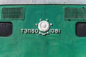 Text and numbers on a metal surface with the symbols of the USSR for design and commercial use photo