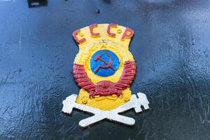 Text and numbers on a metal surface with the symbols of the USSR for design and commercial use photo