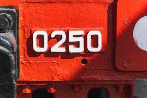 Text and numbers on a metal surface with the symbols of the USSR for design and commercial use photo