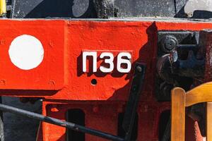 Text and numbers on a metal surface with the symbols of the USSR for design and commercial use photo