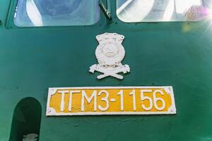 Text and numbers on a metal surface with the symbols of the USSR for design and commercial use photo