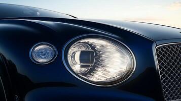 Bright and bold luxury car headlight close-up with generous copy space photo