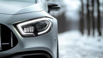 Detailed Mercedes LED Headlights Enhanced by an Elegant Blurred Background photo