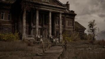 Abandoned mansion in a desolate landscape, overgrown and crumbling video