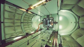 Interior view of a space station module with sleeping quarters and equipment video