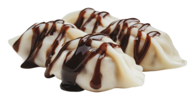 Delicious dumplings with chocolate drizzle on top png