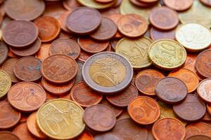 Background texture of a Close-Up of Euro Coins in Various Denominations photo