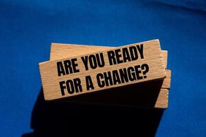 Are you ready for a change message written on wooden blocks with blue background. Conceptual are you ready for a change symbol. Copy space. photo