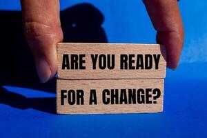 Are you ready for a change message written on wooden blocks with blue background. Conceptual are you ready for a change symbol. Copy space. photo