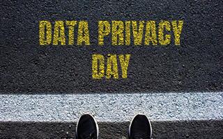 Data privacy day message written on asphalt road. Conceptual data privacy day symbol. Copy space. photo