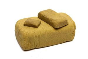Blocks of hashish isolated on white background photo