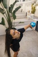 beautiful girl doing gymnastics in the backyard photo