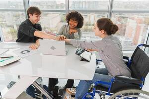 Stack of hands. Business startup teamwork unity concept. Top view of diverse multiracial business people putting hands together. Business colleagues during work process rejoice in success of company photo