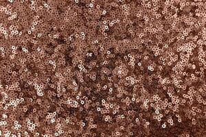 shiny sparkly sequin textured holiday background color of 2025 year photo