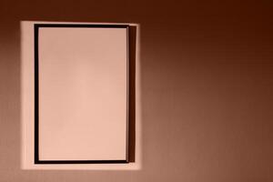 big empty black frame in rectangle of light of setting sun. Apartment design, spf advertisement color of 2025 year photo