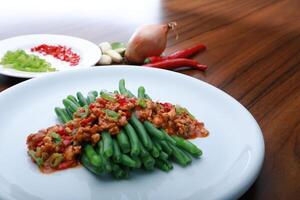 A dish of a String Bean Chicken photo