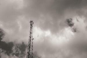 Monochrome Backgrounds of signal transmitter tower in Cicalengka Area, Indonesia. Black and white of Radio and communications technology facilities. Internet and signal. photo