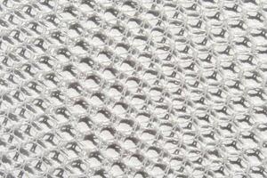 White woven textile pattern with geometric texture and light reflection for background design. photo