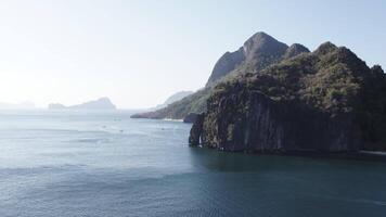 Tropical cliff island and boat in Palawan in Philippines video