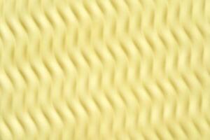 Abstract yellow wavy pattern background with textured surface and repetitive design. photo